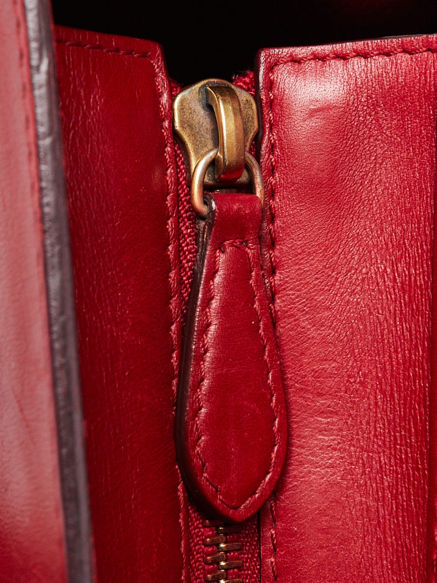 red leather luggage