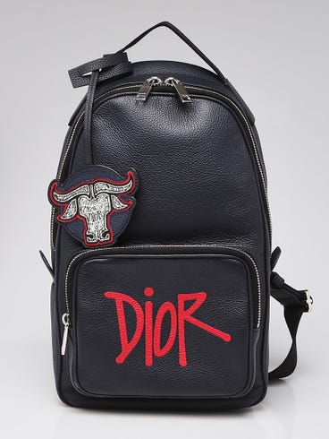christian dior leather backpack Saddle Pocket Large 247018 enhanced by a navy blue and vermilion red DIOR AND KAWS rubber patch with the House signature reinterpreted in the shape of a colorful snake Christian Dior Pre-Owned 2010S Mini