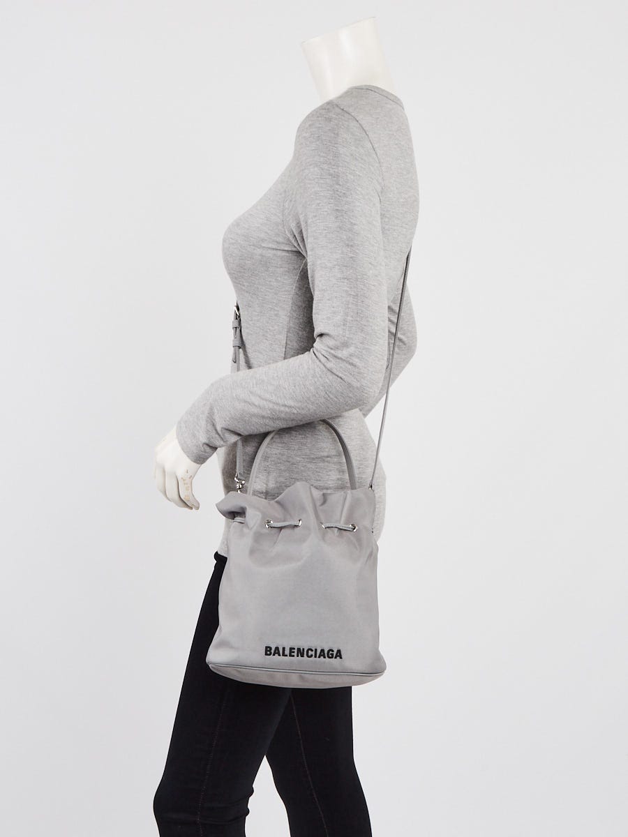 ＊BALENCIAGA＊ WHEEL BUCKET BAG BALENCIAGA WHEEL XS DRAWSTRING BUCKET BAG – Caroline's