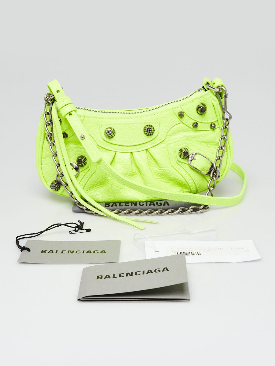 BALENCIAGA Le Cagole mini studded neon texturedleather shoulder bag   NETAPORTER