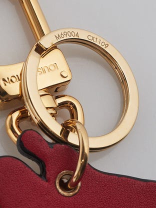 Louis Vuitton Illustre Carousel Monogram Gold Tone Key Chain