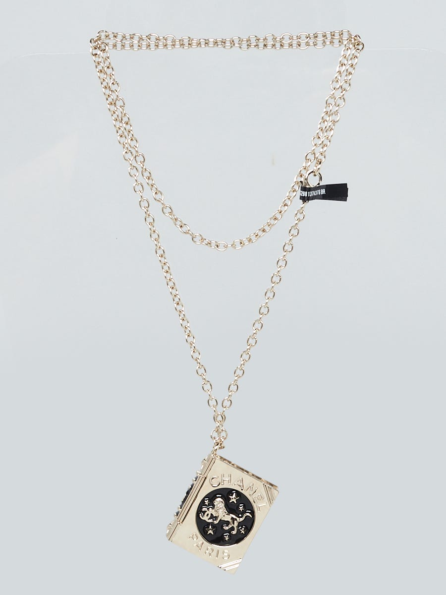 Chanel Goldtone Metal CC Lion Book Locket Pendant Necklace Chanel Goldtone Metal CC Lion Book Locket Pendant Necklace