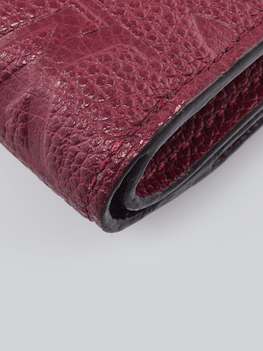 Louis Vuitton Monogram Empreinte Ariane Wallet Raisin at 1stDibs  louis vuitton  ariane wallet, lv ariane wallet, louis vuitton raisin