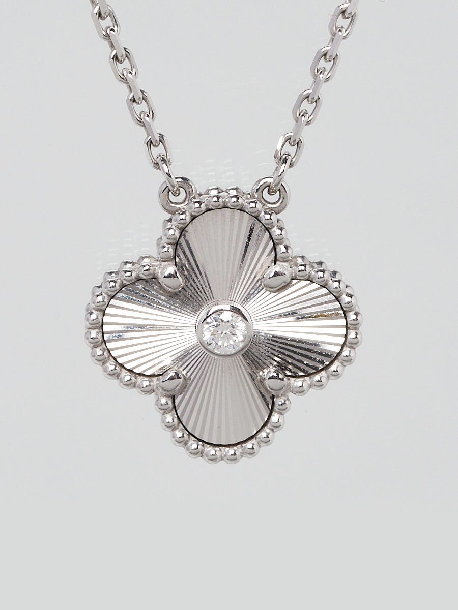 Van Cleef & Arpels Mother of Pearl Magic Alhambra Pendant Necklace –  Dandelion Antiques