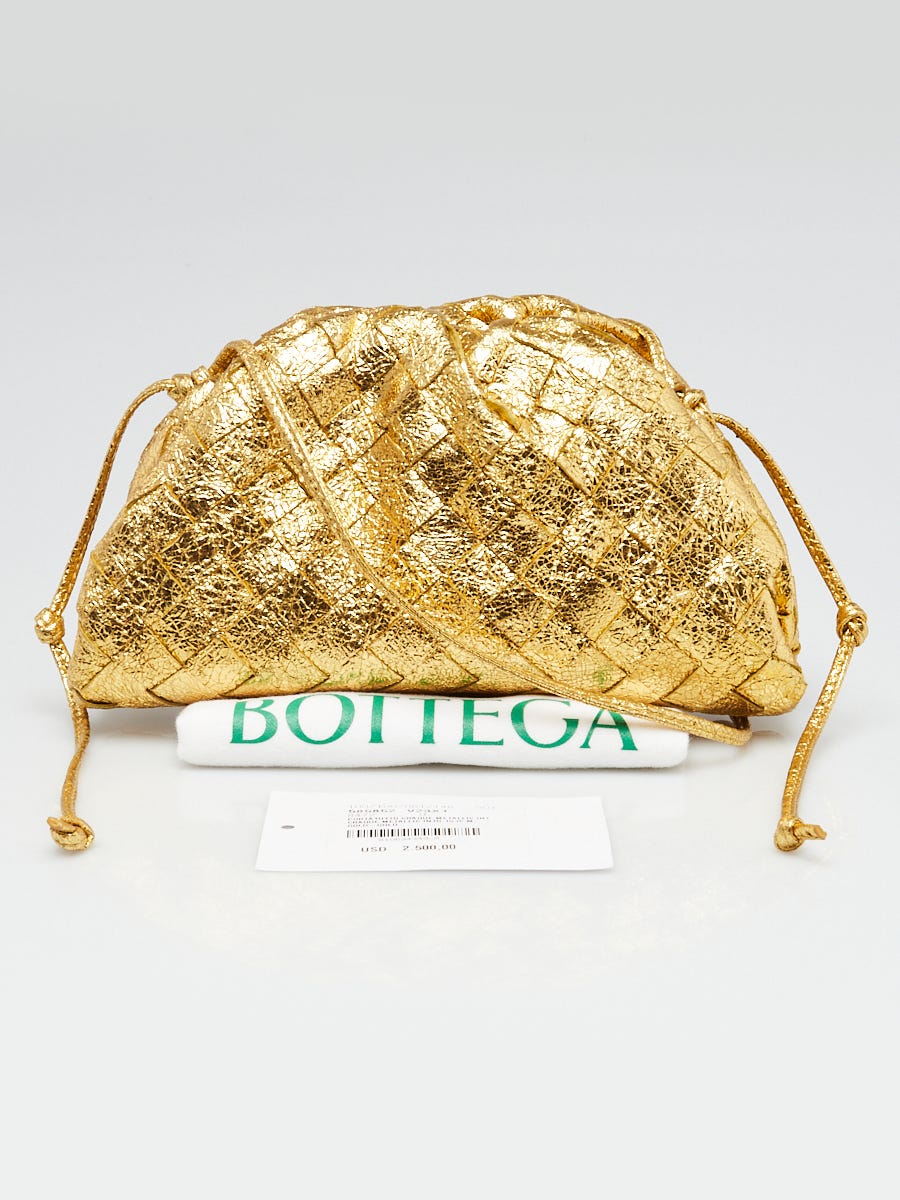 Bottega veneta gold pouch hotsell