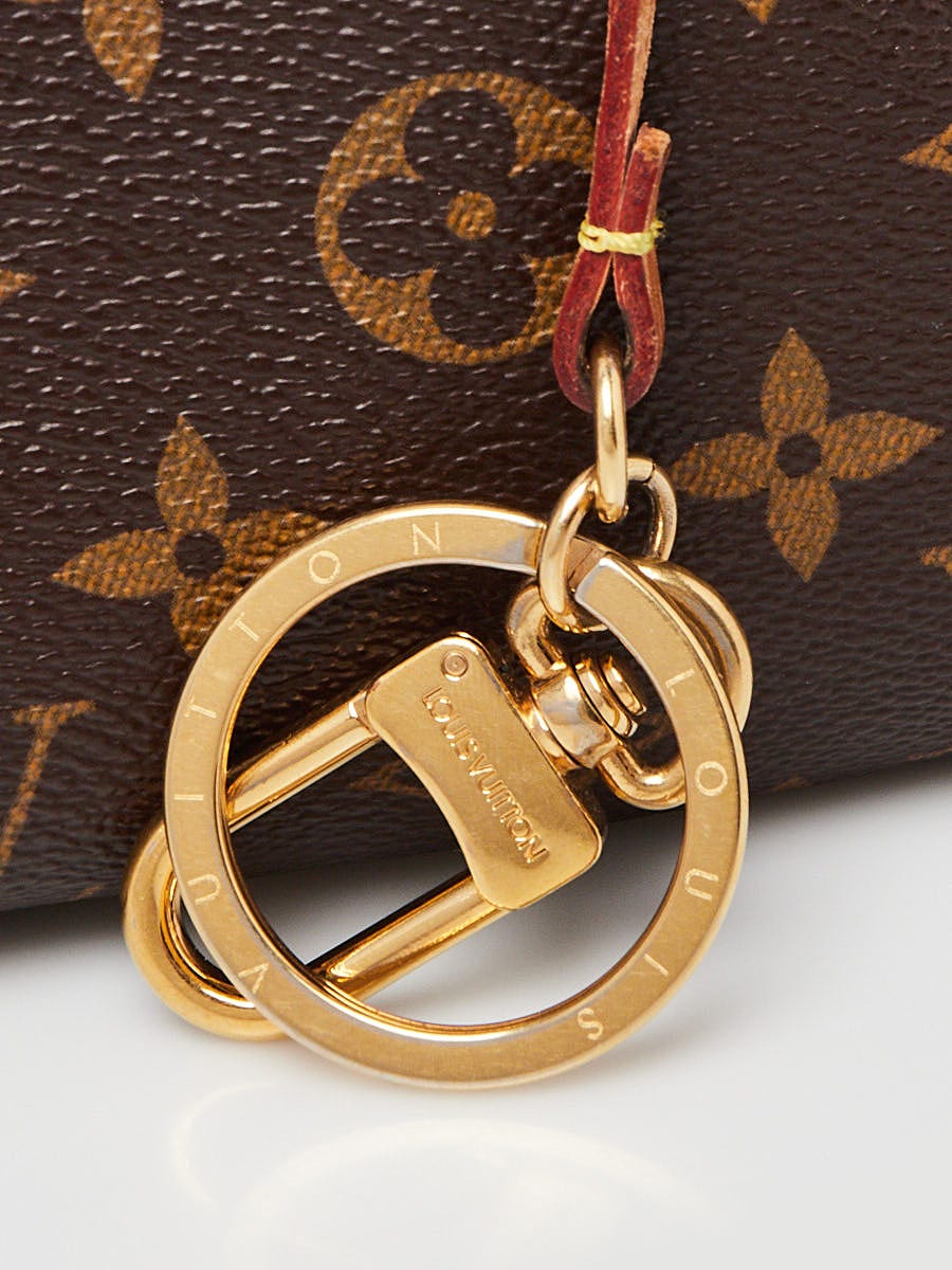 Louis vuitton artsy bag with bag charm
