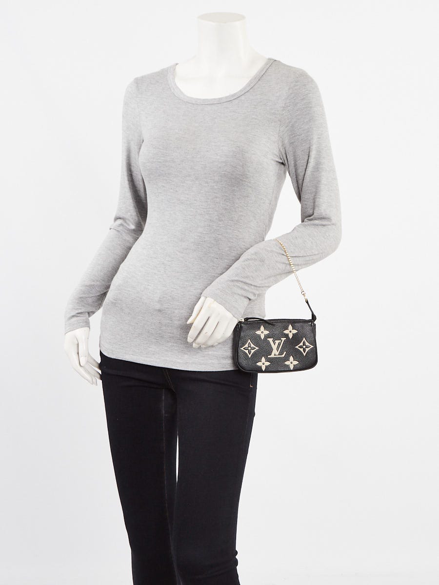 Louis Vuitton Bi-Color Black/Cream Giant Monogram Empreinte Leather Mini  Accessories Pochette Bag - Yoogi's Closet