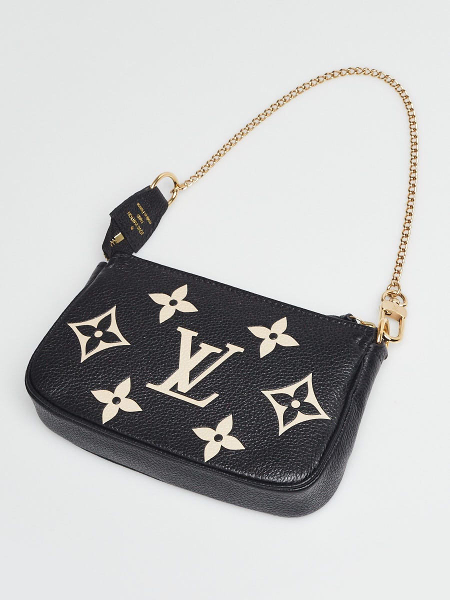 Louis Vuitton Bi-Color Black/Cream Giant Monogram Empreinte Leather Mini  Accessories Pochette Bag - Yoogi's Closet
