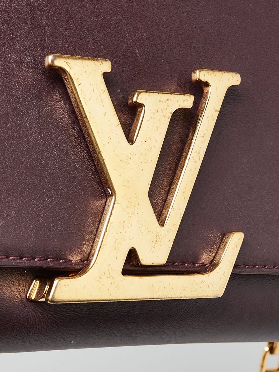 Louis Vuitton Gold Leather Louise Clutch Louis Vuitton | The Luxury Closet