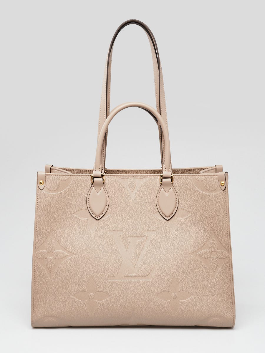 Louis Vuitton Carryall MM in Tourterelle Empreinte Leather