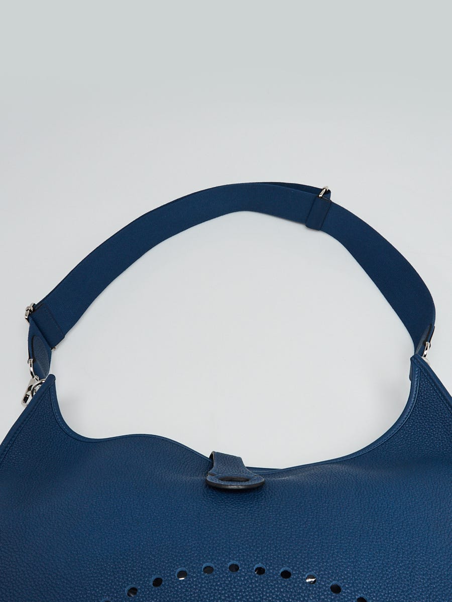 $2695. This is an authentic Evelyn GM bag in the vibrant color