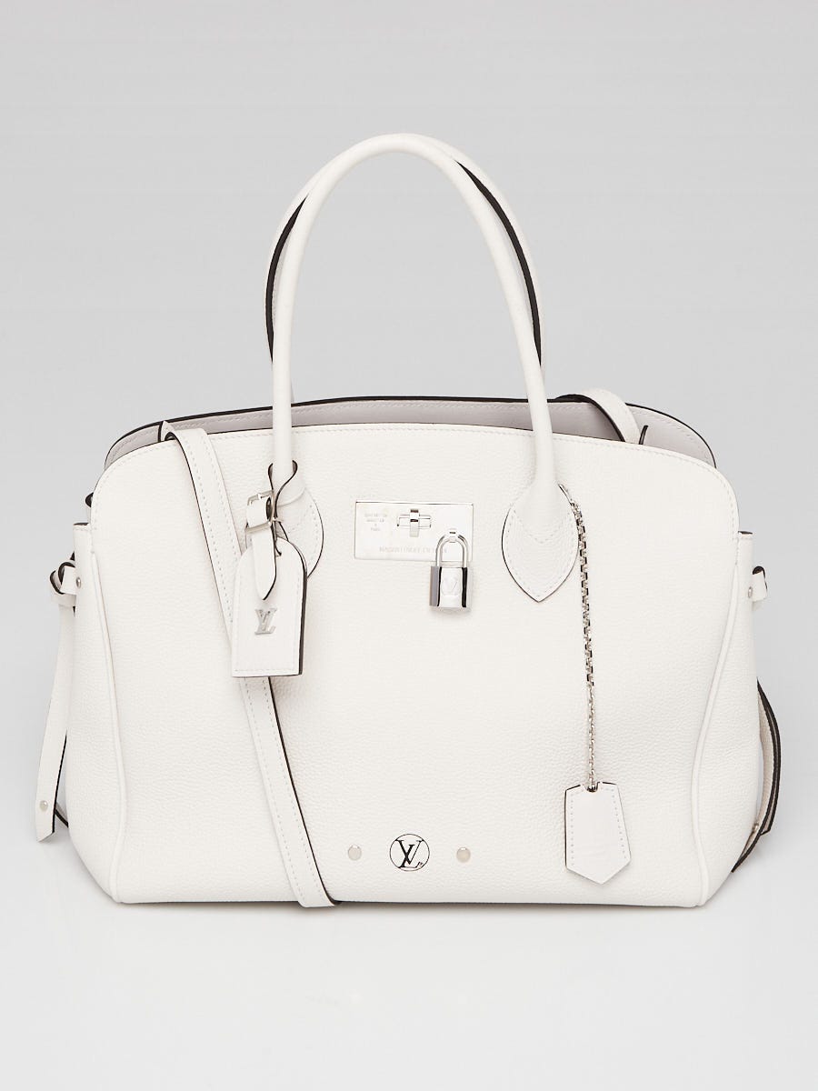 Louis Vuitton Black Twist lock silver Backpack. Leather and