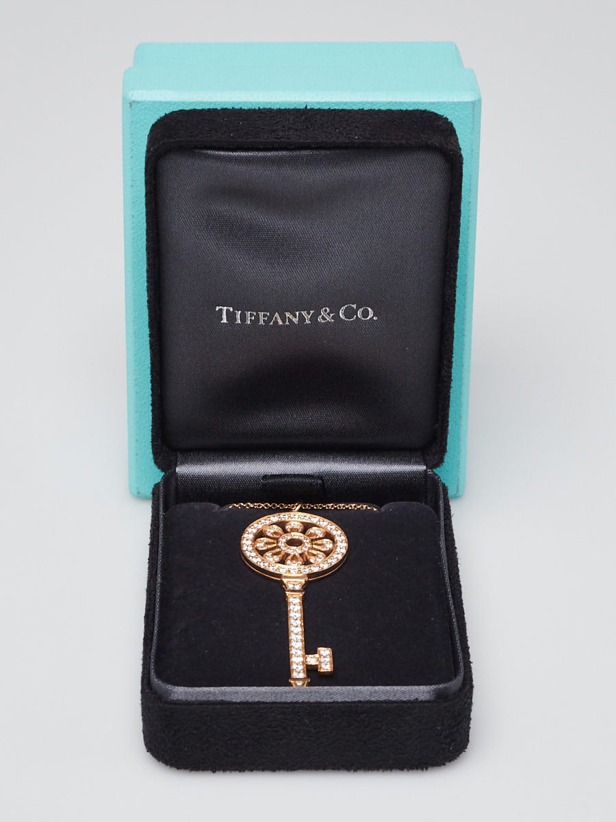 Tiffany 
Co. 18k Yellow Gold and Diamond Tiffany Petals Key Pendant Necklace