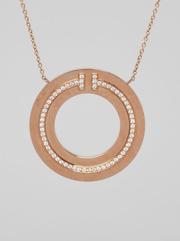 Tiffany
Co. 18k Rose Gold and Diamond Tiffany T Circle Pendant