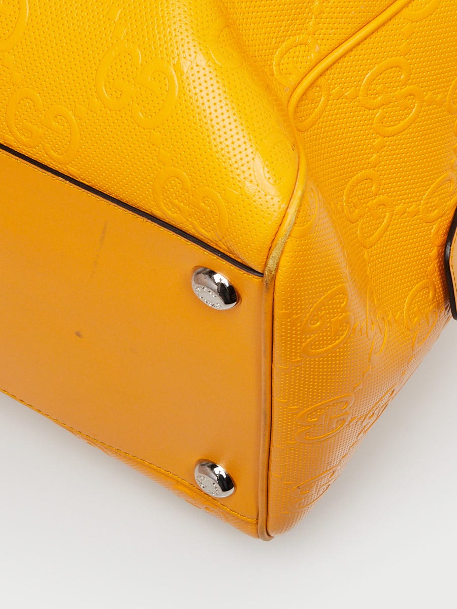 Gucci Yellow GG Perforated Leather Weekender Duffle Bag
