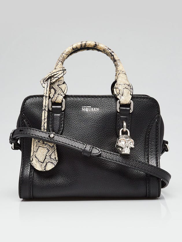 alexander mcqueen mini skull backpack Leather Lock Top Handle Bag ReLuxe Room Alexander McQueens storied heritage is reflected in this pieces fusion of dark romanticism and craftsmanship The Skull Bag | Designer