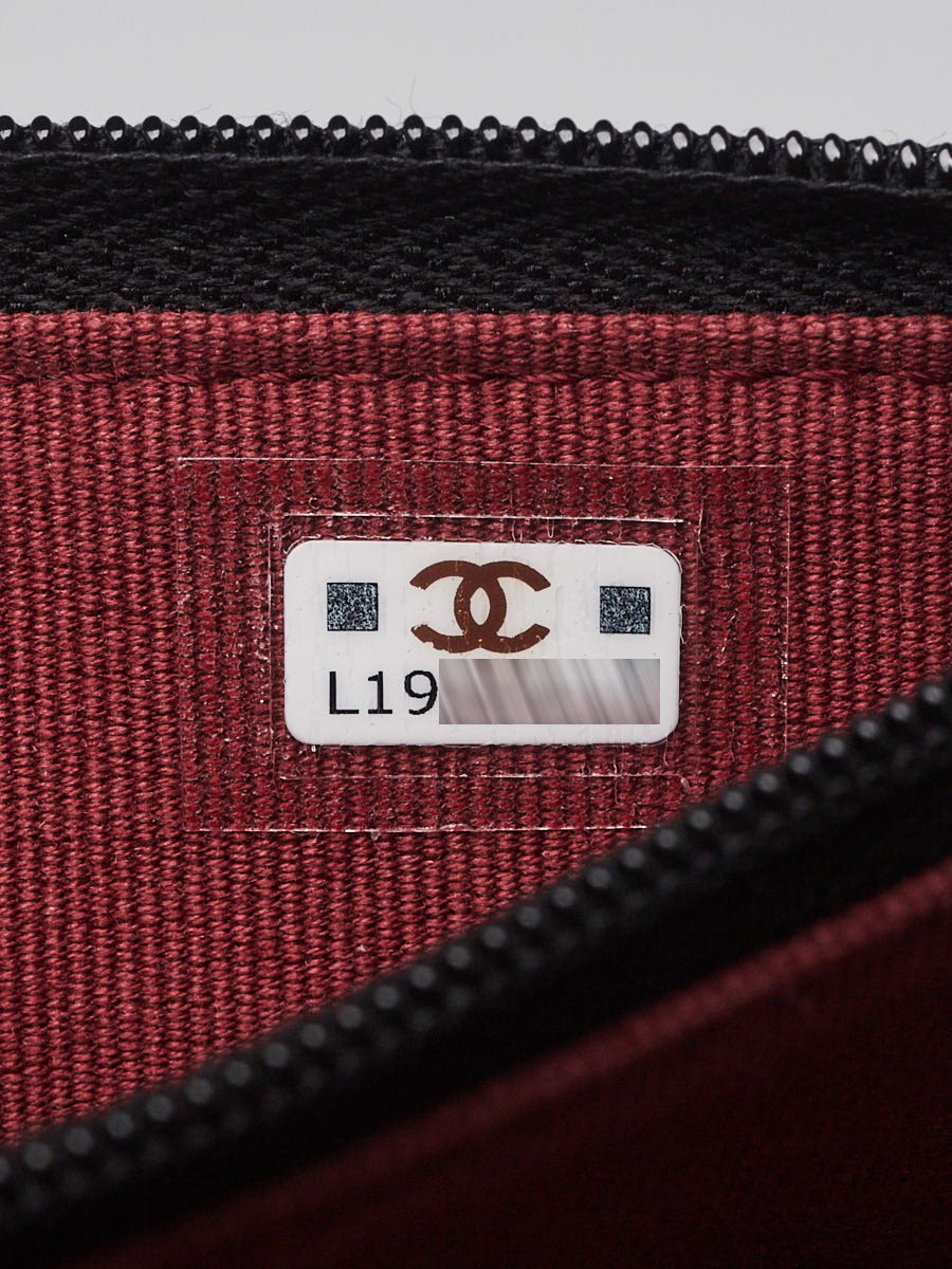 Chanel Black Quilted Lambskin Leather Pearl Chain Mini WOC Clutch