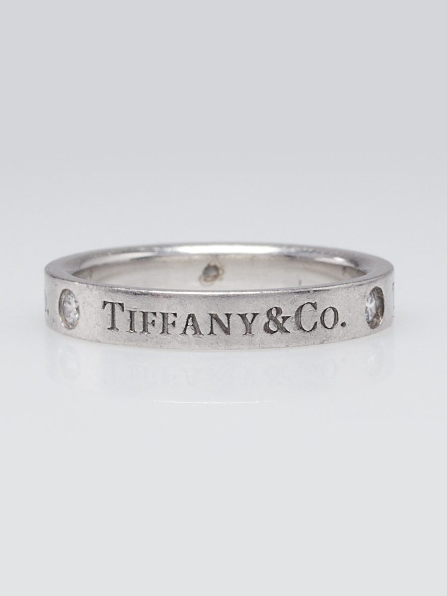 Tiffany & Co. Platinum and Three Diamonds Signature Ring Size 5.5