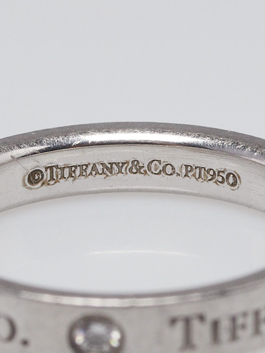 Tiffany & Co. Platinum and Three Diamonds Signature Ring Size 5.5