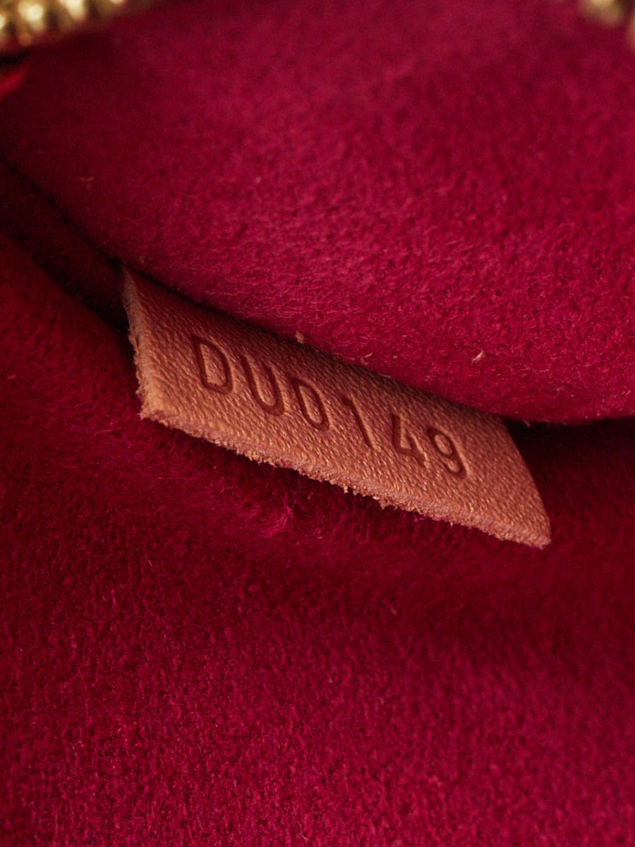 Louis Vuitton Limited Edition Monogram Canvas Love Lock Pochette