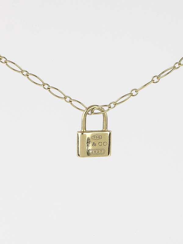 Authentic Tiffany & Co. Silver and 18K Gold Round Mini Lock 