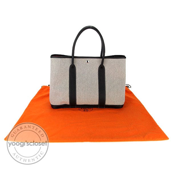 A TOILE AND BLACK LEATHER GARDEN PARTY BAG, HERMÈS, 2000