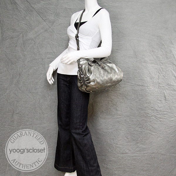 Louis Vuitton Silver Mahina XS Silvery Leather Pony-style calfskin  ref.150113 - Joli Closet