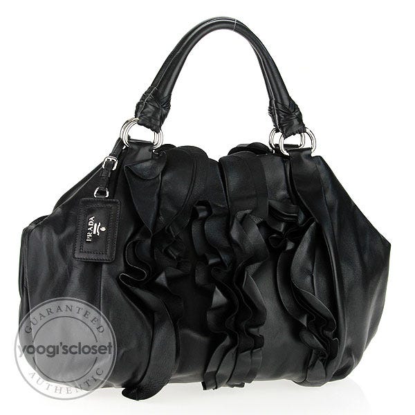 PRADA RUFFLE NAPPA BAULETTO BAG, black leather with silver tone hardware,  double top handles, zip closure at the top, pleated ruffled details at the  top, with authenticity card and dust bag, 40cm
