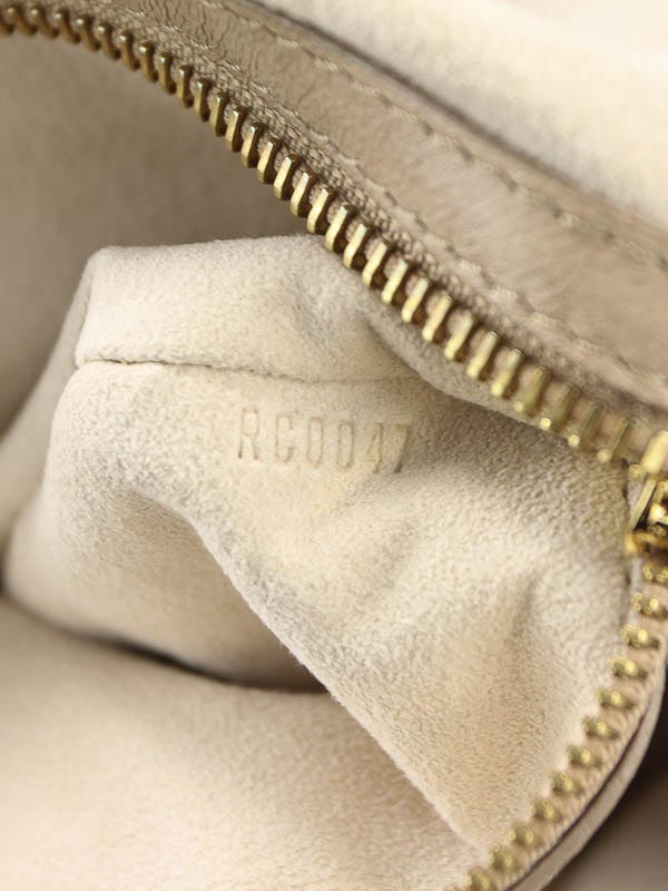 Louis Vuitton Limited Edition Beige Monogram Olympe Stratus PM Bag -  Yoogi's Closet