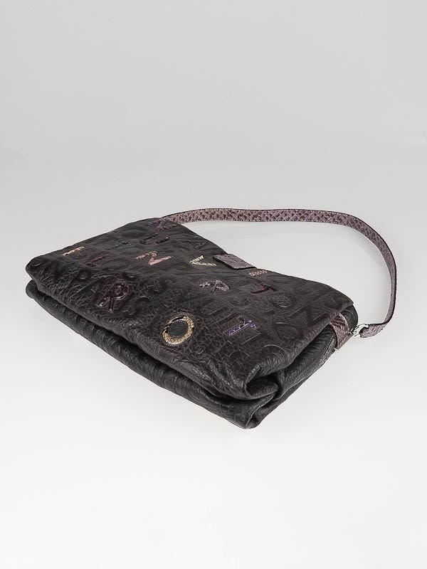 Louis Vuitton Limited Edition Black Monogram Collage Lutece Bag