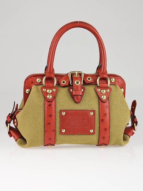 LOT:371  LOUIS VUITTON - a limited edition Sac de Nuit Toile Trianon  Canvas Ostrich PM handbag.